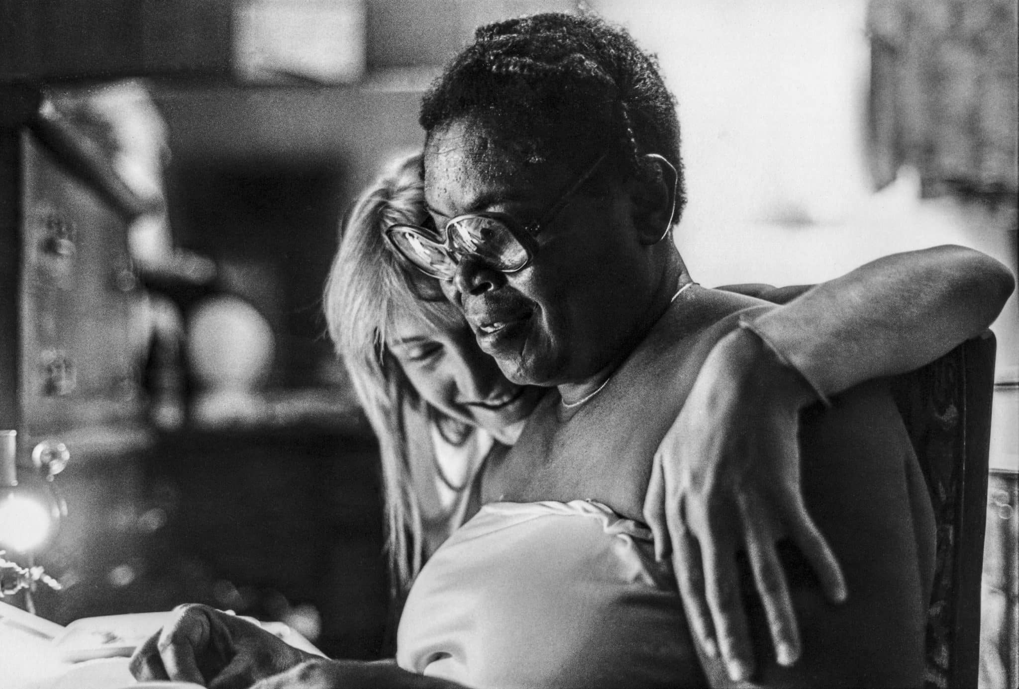 Sewing with Cully, c. 1982 © Lisa McCord